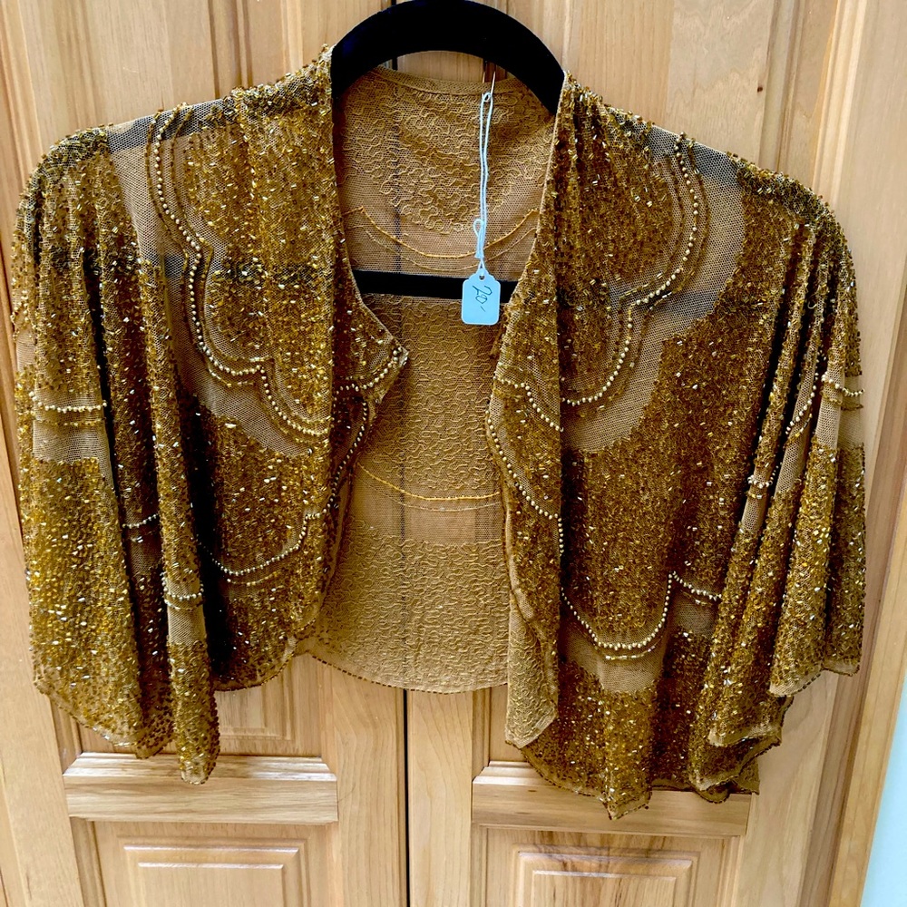 Vintage gold beaded cape, black oblong sequin scarf.